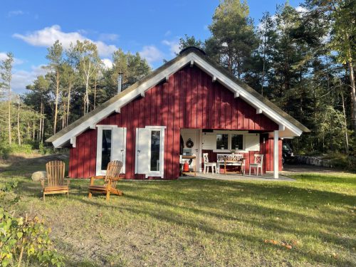 Grundstück mit Holzhaus Reet gedeckt